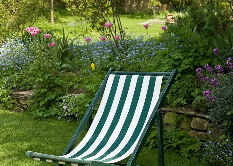 deckchair, spring garden, tulips, photo credit paula connelly getty images