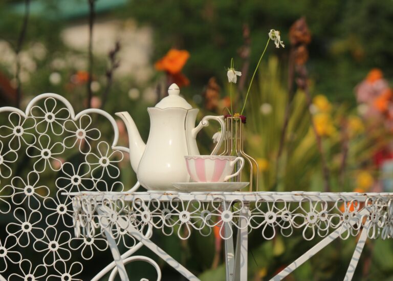 tea in the garden, pretty metal table & chair, photo credit nsanchez on canva